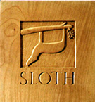 Sloth: a wood carving