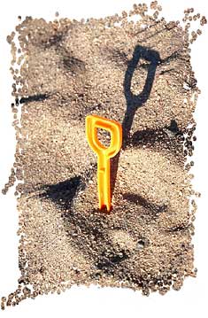 Shovels in the sand