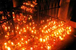 Votive candles lit in memoriam