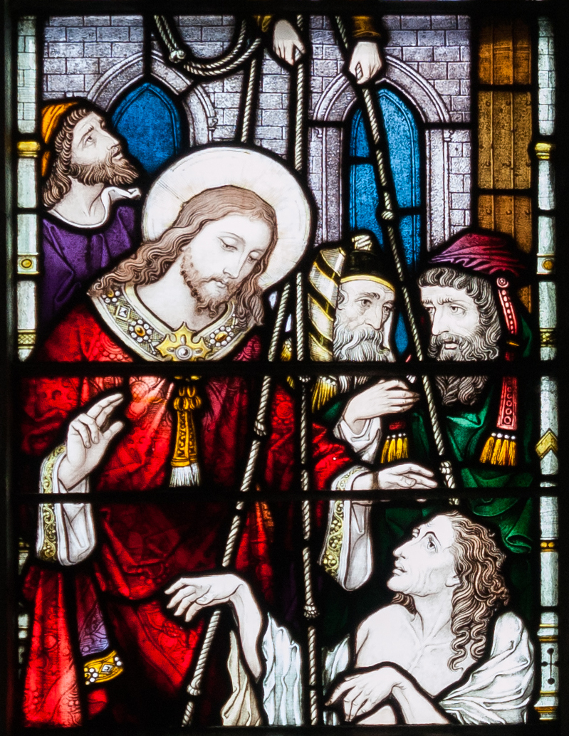 Stained glass window of Jesus healing the paralyzed main lowered though the roof (Andreas F. Bourchart, CC BY-SA 3.0 DE), 